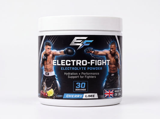 A white plastic tub of EF Electro-Fight Electrolyte Powder in Cherry Lime flavor, featuring a black label with images of two fighters and product details.